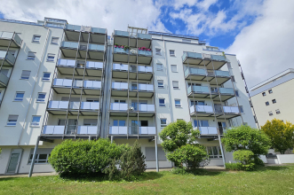 Rückansicht Wohn- und Geschäftshaus KA-Neureut